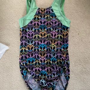 Peace sign pattern gymnastics leotard
